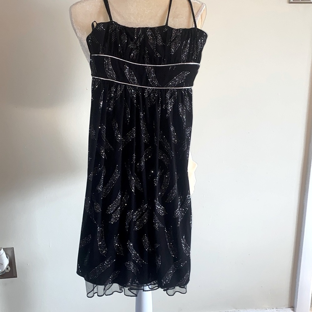 Black and silver junior cocktail dress from city studio.